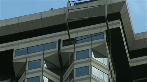 Firefighters Rescue 2 Window Washers Stuck On Scaffold Above Wall