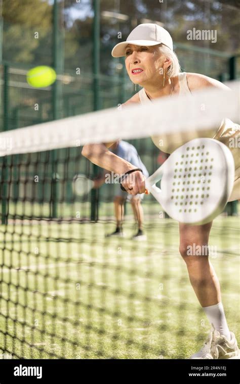 Old Woman Playing Padel Tennis In Open Air Tennis Court Stock Photo Alamy
