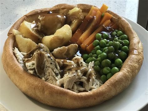Homemade Giant Yorkshire Pudding Holding A Lazy Roast Food