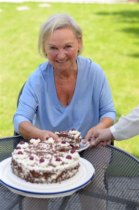 Elderly Lady Enjoying A Slice Of Cake Stock Image Image Of Lady