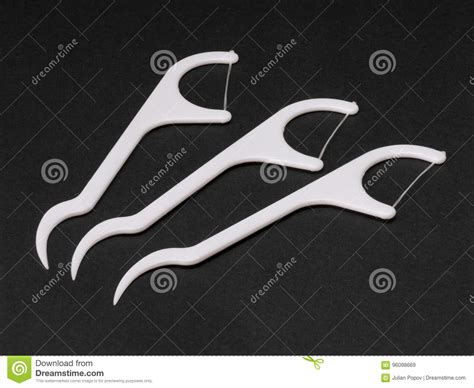 Closeup Of Floss Stick For Dental Hygiene And Oral Care Stock Image