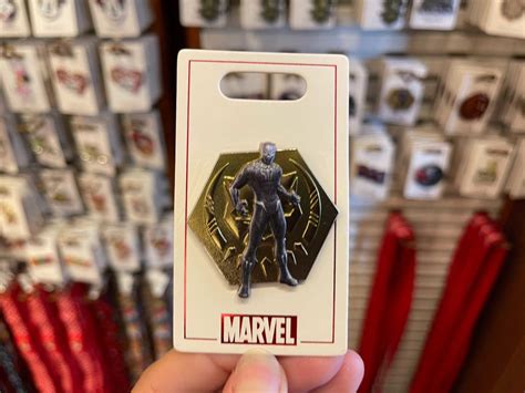 photos new open edition marvel pins assemble at walt disney world wdw news today