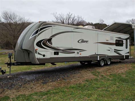 We have hundreds of new & used travel trailer campers in our inventory. 2014 Used Keystone COUGAR 31RLS Travel Trailer in Tennessee TN