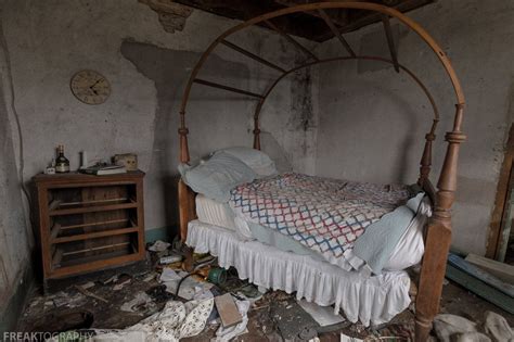 An Amazing Canopy Bed Inside An Abandoned House In The Middle Of