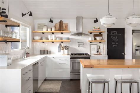 You either lucked out with cupboards that stretch all the way to the ceiling, have open shelving, or this blank spot just hasn't come to your attention yet. How To Style Your Open Kitchen Shelving