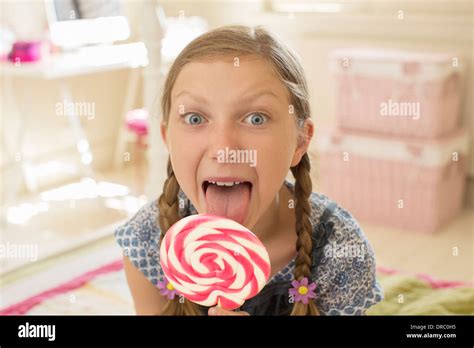 Young Girl Licking Lollipop Stockfotos Und Bilder Kaufen Alamy