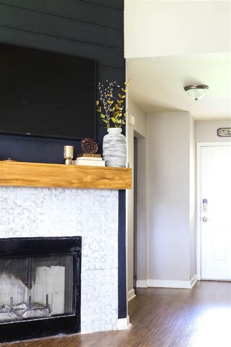 Or a little bun in the oven. DIY Shiplap Fireplace Makeover - Love & Renovations