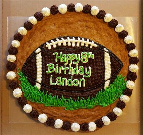 Check out a cake decoration store for some plastic figs. Football Cookie Cake. | Cookie cake birthday, Giant cookie ...