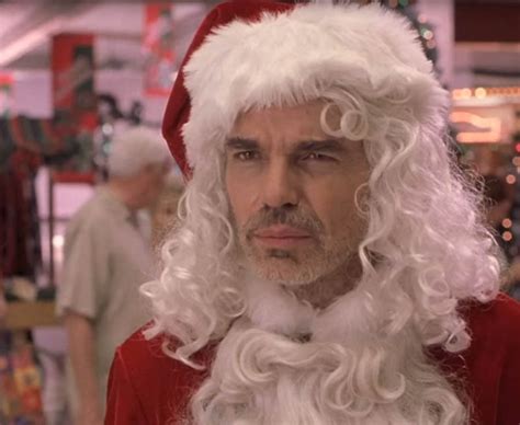 Bad santa is a 2003 film about a miserable con man and his partner who pose as santa and his little helper to rob department stores on christmas eve. 358535.jpg