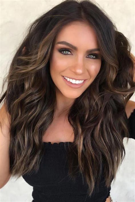 dark brown with caramel highlights wavy brownhair dark brown hair color looks very mys… in 2020