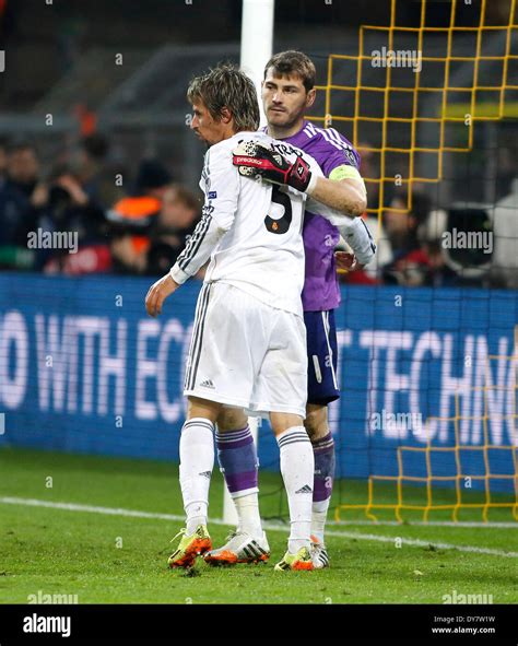 Madrids Goalkeeper Iker Casillas R Celebrates The Victory With Fabio