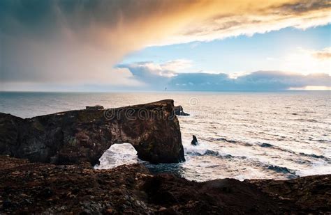 Dyrholaey Peninsula In Iceland With Volcanic Rocks In The Sea Stock