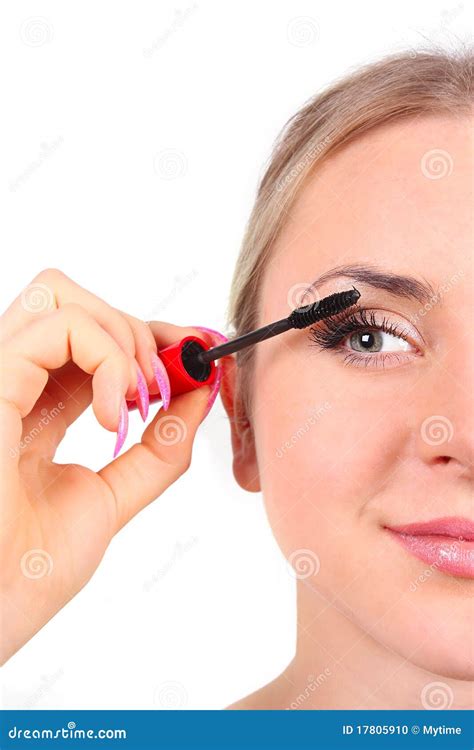 Beautiful Woman Applying Mascara On Her Eyelashes Stock Photo Image