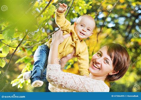 Charming Wife Carrying Little Child Stock Image Image Of Autumn