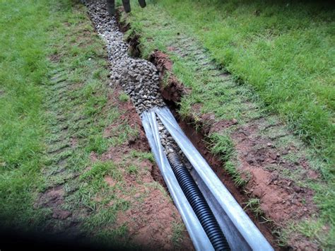 Learn how to install a french drain to direct runoff water out of your yard. French Drain in Yard| Sandy Springs, GA - Everdry Atlanta