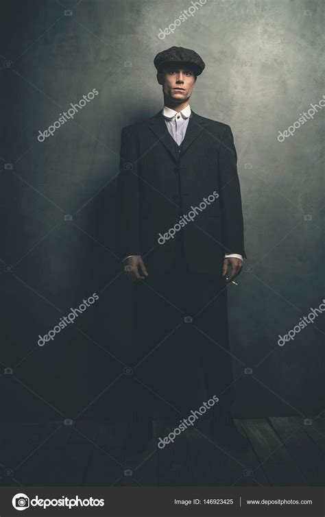 Gangster Standing With Cigarette Stock Photo By ©ysbrand 146923425