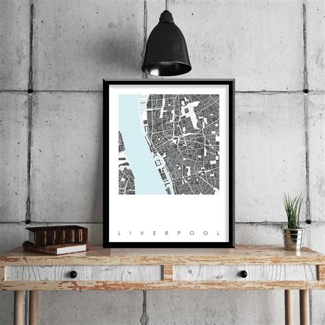 This illustrated map of the city of liverpool, england contains some of the cities most iconic landmarks including the liver buildings and its two cathedrals. liverpool map art print limited editon by bronagh kennedy ...