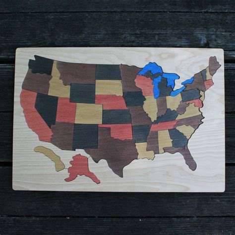 No two pieces in any puzzle are alike, and each puzzle features dozens of intricate, charming whimsy pieces. USA Wooden Map Puzzle - The Puzzle Man
