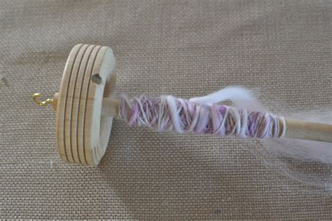 How to make a drop spindle. Of Wool and Loveliness: Make an Easy Drop Spindle for $1.75