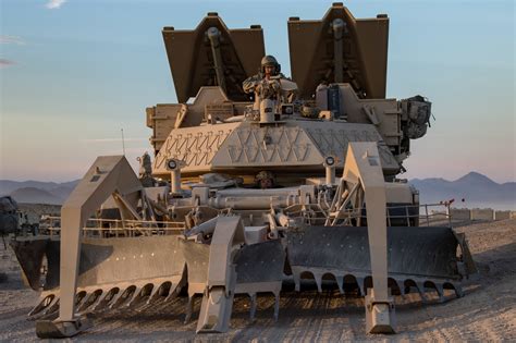 Soldiers Position Their M1150 Assault Breacher Vehicle During A Live Fire Training Exercise At