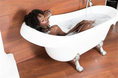 Premium Photo Pretty Black Woman Having A Bath