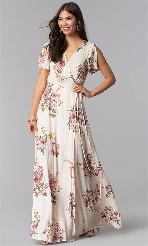 Look like a regal princess as you twirl in stunning elegance in this blush 5661 creation. V-Neck Floral-Print Maxi Wedding Guest Dress -PromGirl