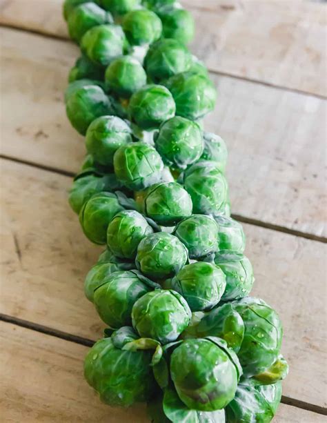 Maple Roasted Brussels Sprouts On The Stalk Running To The Kitchen