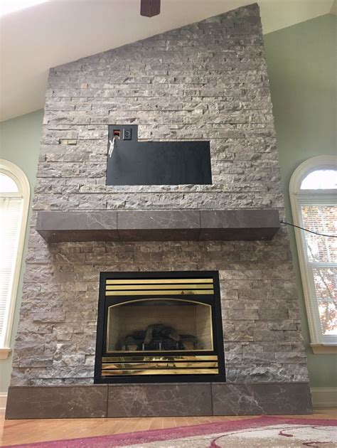 Update Your Old Fireplace With Ledger Stone Fireplace Old Fireplace