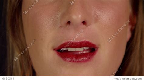Close Up Slow Motion Female Licks Her Red Lips Stock Video Footage