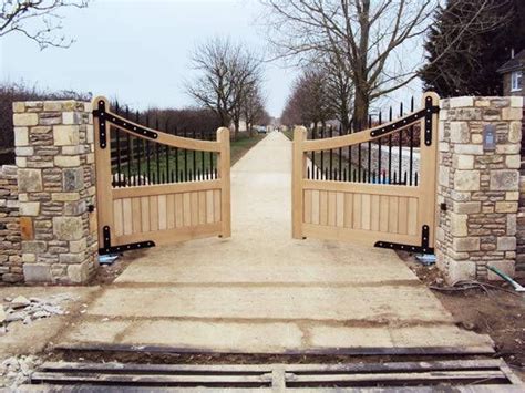 For those with oddly sized driveways, this design is especially great as the builder talks about the. Open & Secure Driveway Gates | Oak Leaf Gates | Driveway ...