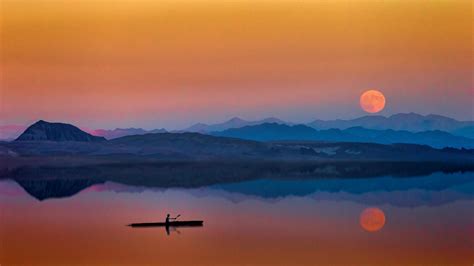 2560x1440 Lake Boat Man Sunset 1440p Resolution Hd 4k Wallpapers