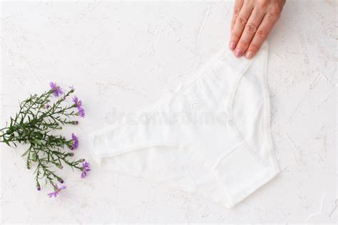 Woman S Hand With Beautiful Panties On White Background Stock Photo