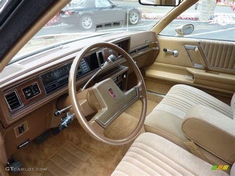 Beige Interior 1987 Oldsmobile Cutlass Supreme Coupe Photo 50610528