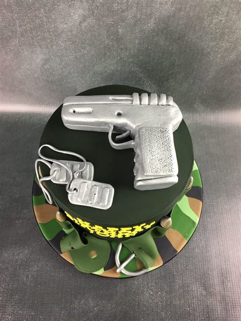Creative army cake design decorating ideas. Gun Birthday cake - Mel's Amazing Cakes