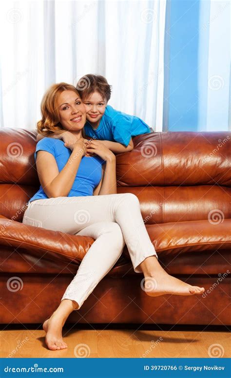 Happy Mother And Son Portrait At Home Stock Photo Image Of Couch