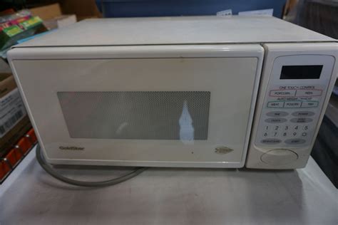 White Goldstar Microwave And Office Phones Big Valley Auction