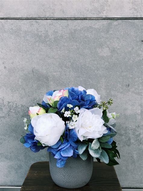 Our friendly delivery drivers take pride in delivering our beautiful funeral tributes, visiting locations such as mount gravatt cemetery. Blue, White & Grey Silk Arrangement - The Lush Lily ...