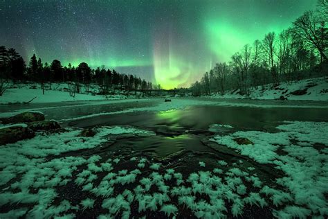 Aurora Borealis Over A River Photograph By Tommy Eliassenscience Photo