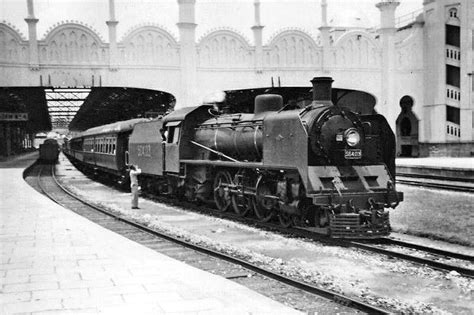 Immigration procedures crossing the border from malaysia to singapore by train. Steam train at Kuala Lumpur railway station c. 1950 ...