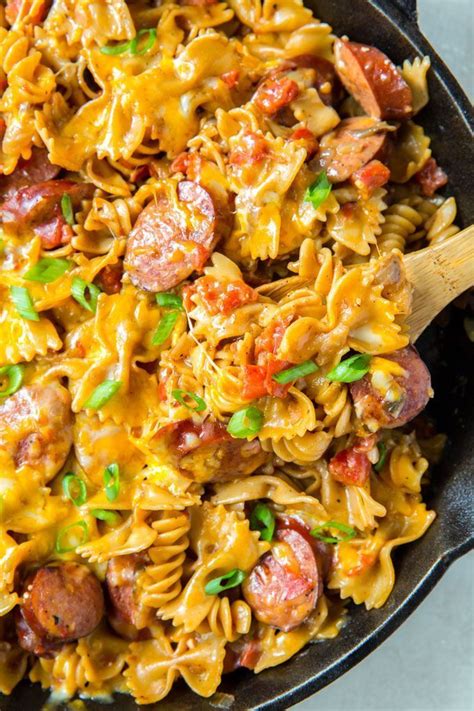 Add sausage and onions until lightly browned. On Pan Cheesy Smoked Sausage Pasta Skillet | Recipe in ...