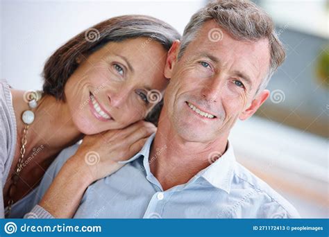 Nurturing Their Marriage Portrait Of A Loving Mature Couple At Home