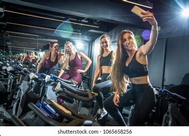 Sporty Girls Taking Selfie While Sitting Stock Photo Edit Now