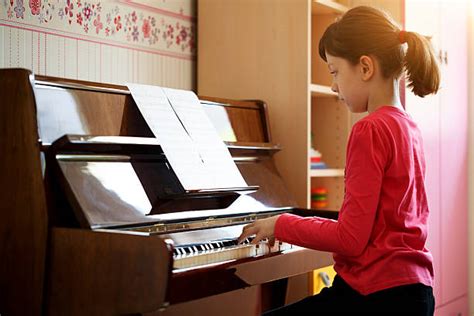 Girl Playing Piano Stock Photos Pictures And Royalty Free Images Istock