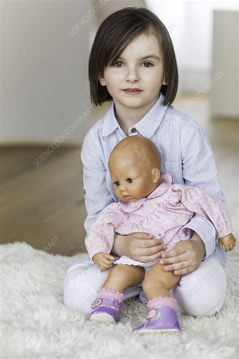 Portrait Of Young Girl Holding Doll Stock Image F0112712 Science