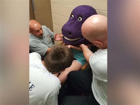 Firefighters Free Alabama Teen Who Got Stuck Inside A Giant Barney Head Abc News