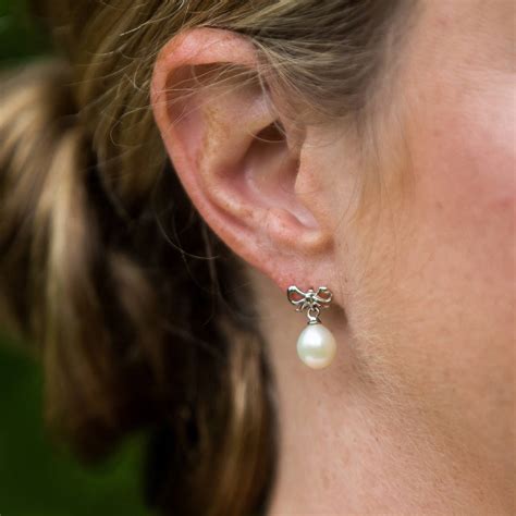 Bow Pearl Drop Earrings By Tigerlily Jewellery Notonthehighstreet Com