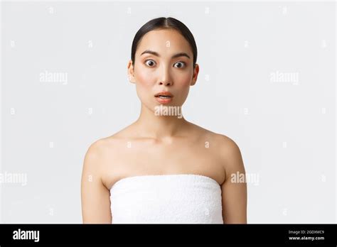 Beauty Cosmetology And Spa Salon Concept Shocked Beautiful Asian Girl Standing In Awe Wearing