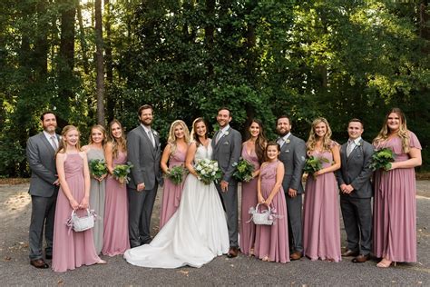 Wedding Party In Mauve And Grey Outfits Bridesmaids In Mismatched