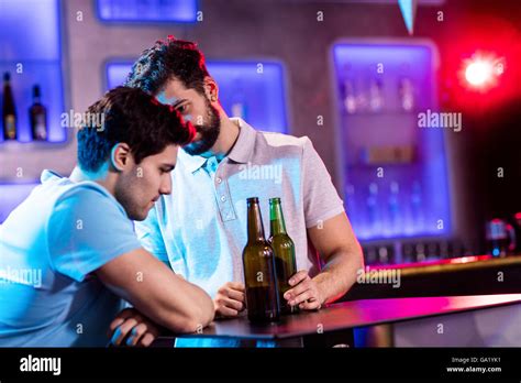 Man Consoling His Depressed Friend Stock Photo Alamy