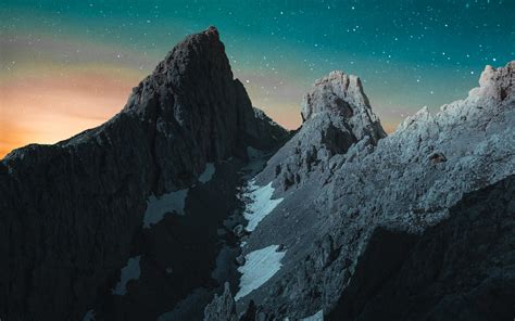 1680x1050 Vibrant Evening Sky Rocks Mountains 4k Wallpaper1680x1050